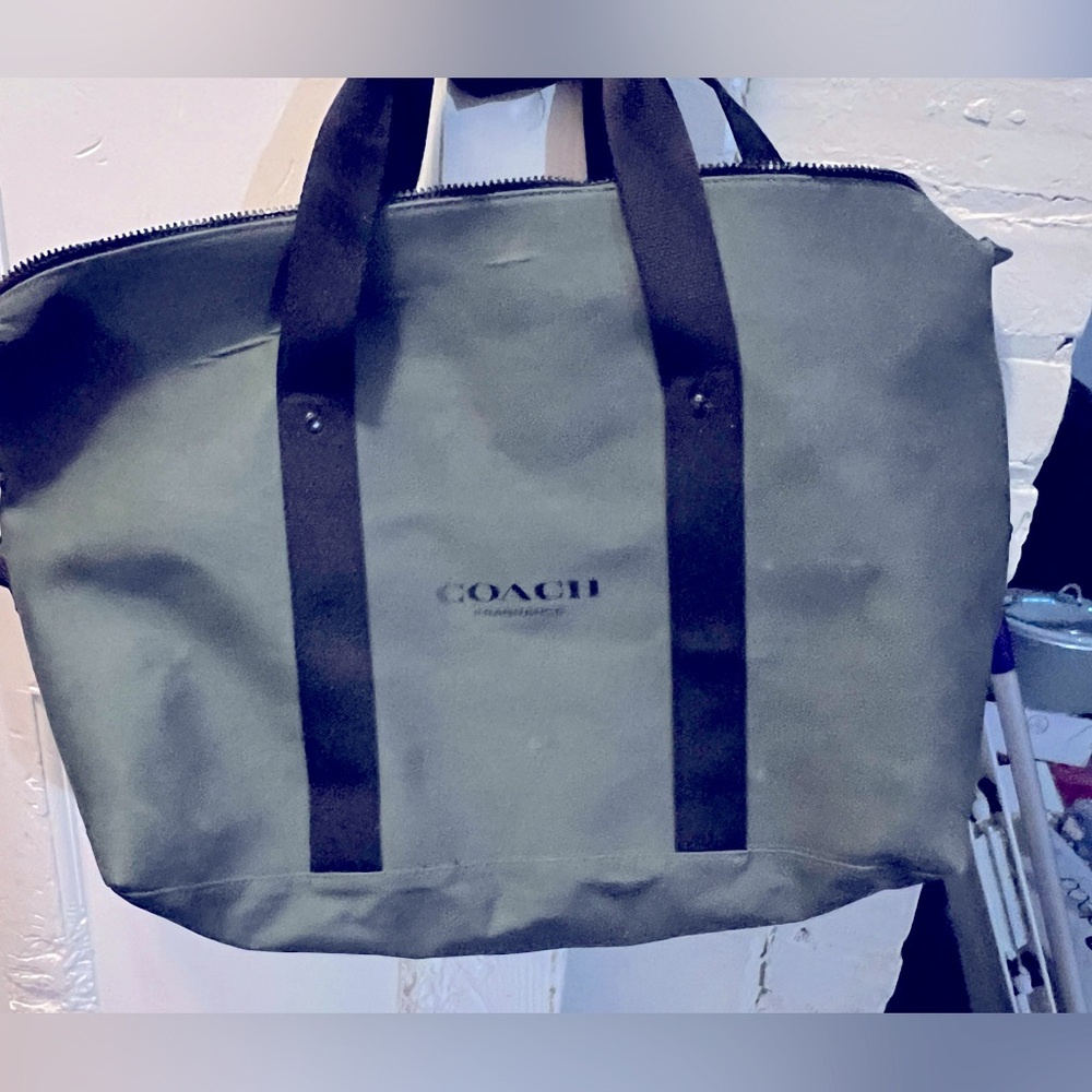 COACH army green duffle bag. Used it for a weekend trip and zipper broke